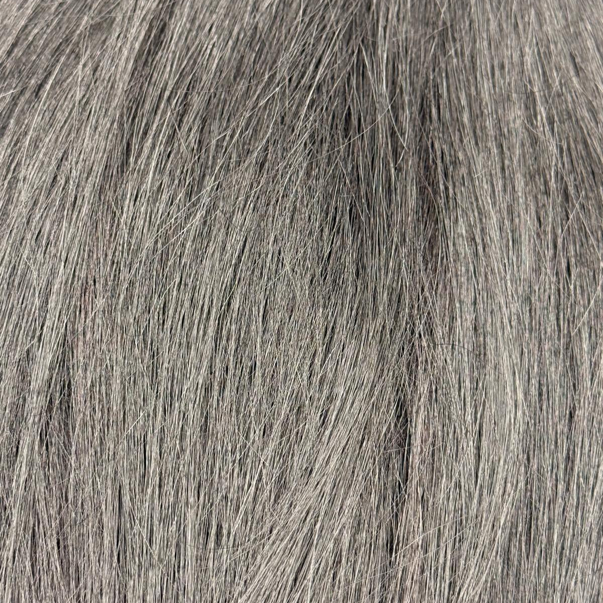 Nahaufnahme der Echthaar-Struktur von Bonding Extensions in Schwarz