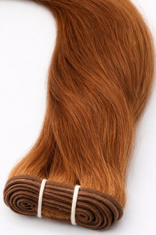 Hochwertig verarbeitete Echthaar-Tressen in Kupferblond für den ROVIA Hair Salon Basel.