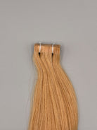 Tape In Strähnen in Gold-Sand-Blond mit flacher Klebeverbindung für unsichtbare Haarverlängerung