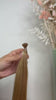 Bonding Extensions in Beigeblond-Gold aus Echthaar von ROVIA Hair Basel im Video